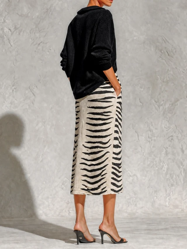 Aelyra - Strickpullover mit Soft-Touch & Midi-Jupe im Zebra-Print aus Leinen